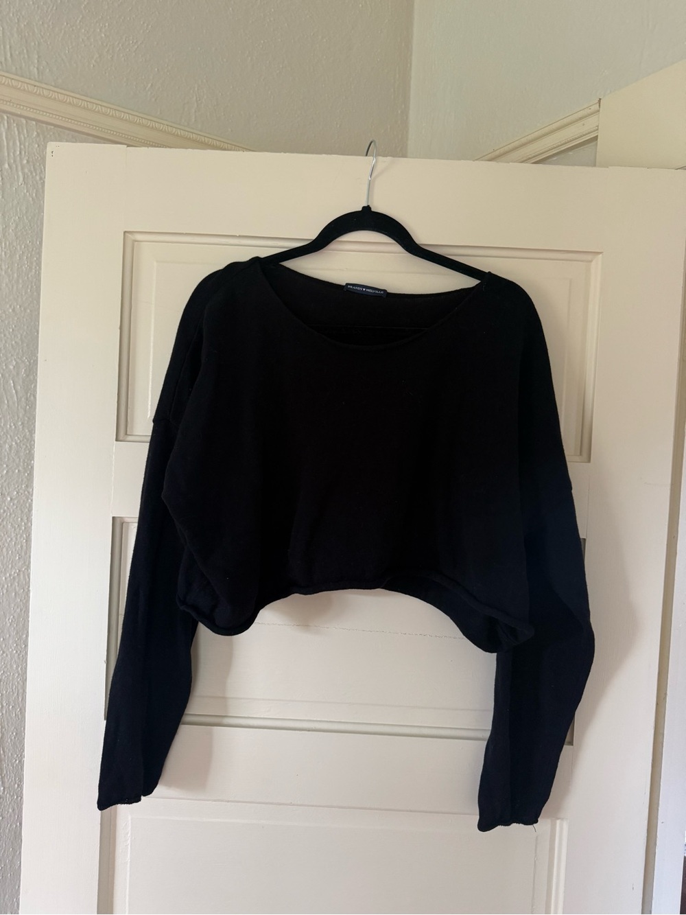 Black Cropped Long-Sleeve Top by Brandy Melville